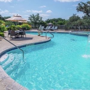 Relaxing pool area at Hilton San Antonio Hill Country.