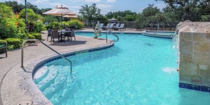 Relaxing pool area at Hilton San Antonio Hill Country.