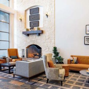 Lobby and coworking lounge at Hilton San Antonio Hill Country.