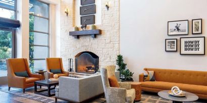 Lobby and coworking lounge at Hilton San Antonio Hill Country.
