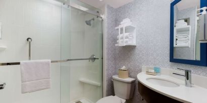 Guest bathroom with shower at Hampton Inn Ft. Lauderdale-Cypress Creek.