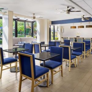 Dining and coworking space at Hampton Inn Ft. Lauderdale-Cypress Creek.