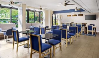 Dining and coworking space at Hampton Inn Ft. Lauderdale-Cypress Creek.