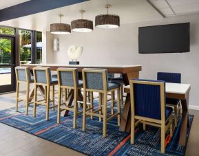 Lobby and coworking lounge at Hampton Inn Ft. Lauderdale-Cypress Creek.