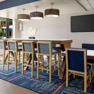 Lobby and coworking lounge at Hampton Inn Ft. Lauderdale-Cypress Creek.