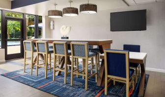 Lobby and coworking lounge at Hampton Inn Ft. Lauderdale-Cypress Creek.