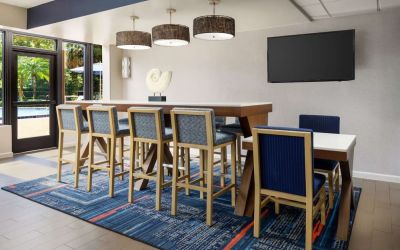 Lobby and coworking lounge at Hampton Inn Ft. Lauderdale-Cypress Creek.