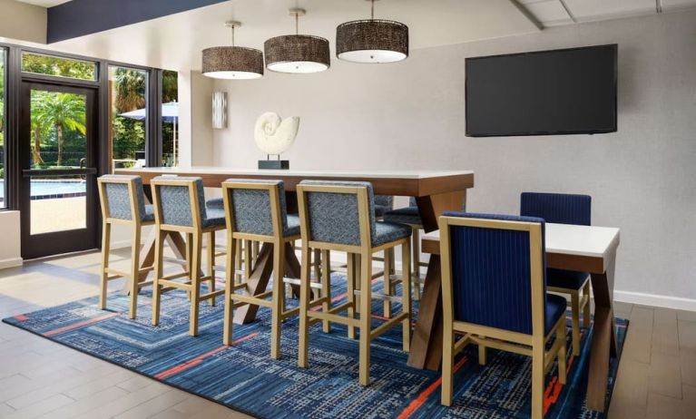 Lobby and coworking lounge at Hampton Inn Ft. Lauderdale-Cypress Creek.