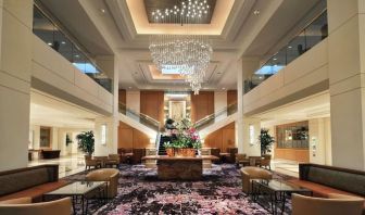 Lobby lounge area and workspace at Hilton Los Angeles Airport.