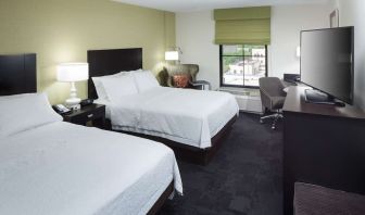 Day use twin room with work desk at Hampton Inn & Suites Gainesville-Downtown.