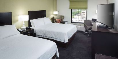 Day use twin room with work desk at Hampton Inn & Suites Gainesville-Downtown.
