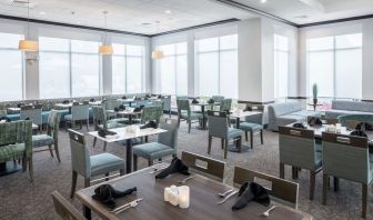 Dining area with comfortable seating, perfect for coworking at Hilton Garden Inn Dothan.