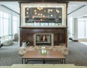 Lobby lounge area with fireplace at Hilton Garden Inn Dothan.