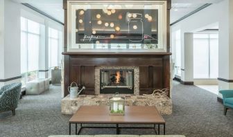 Lobby lounge area with fireplace at Hilton Garden Inn Dothan.