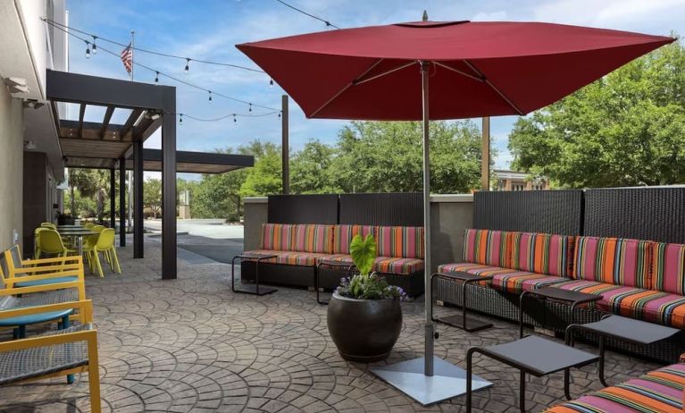 Outdoor lounge seating at Home2 Suites By Hilton Charleston Airport/Convention Center.