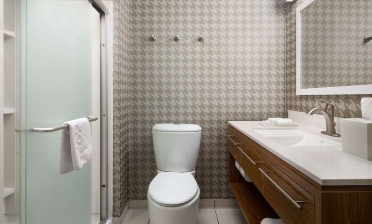Private guest bathroom with shower and free toiletries at Home2 Suites By Hilton Charleston Airport/Convention Center.