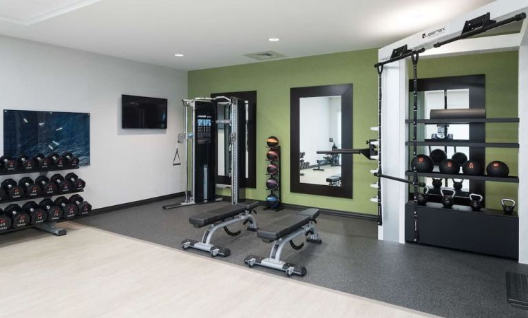 Fully equipped fitness center at Home2 Suites By Hilton Cape Canaveral Cruise Port.