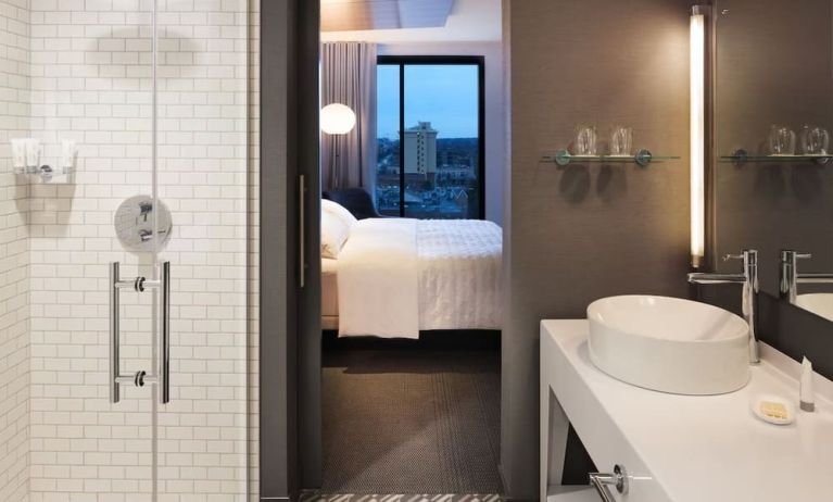 Private guest bathroom with shower at Le Méridien Columbus, The Joseph.