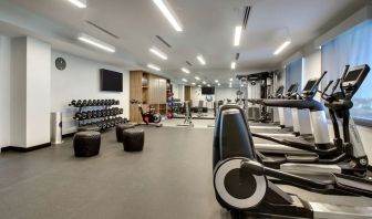 Well equipped fitness center at The Rose Hotel Chicago O’Hare, Tapestry Collection By Hilton.