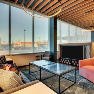 Lobby lounge area at The Rose Hotel Chicago O’Hare, Tapestry Collection By Hilton.