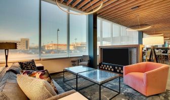 Lobby lounge area at The Rose Hotel Chicago O’Hare, Tapestry Collection By Hilton.