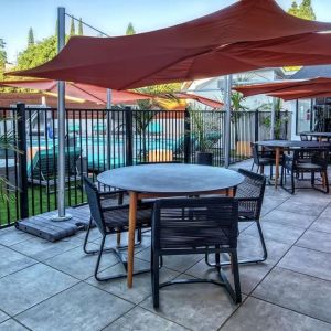 Hotel terrace with lounge seating at Hampton Inn Vallejo.