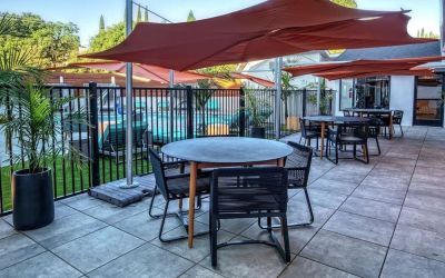 Hotel terrace with lounge seating at Hampton Inn Vallejo.