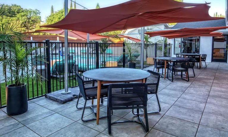 Hotel terrace with lounge seating at Hampton Inn Vallejo.