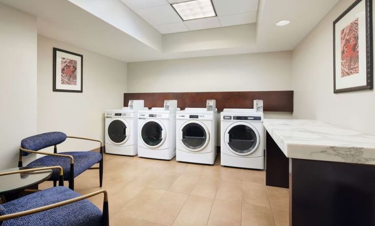 Laundry room available for guests at Embassy Suites By Hilton West Palm Beach Central.