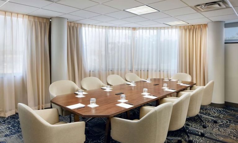 Professional meeting room with comfortable seating at Embassy Suites By Hilton West Palm Beach Central.