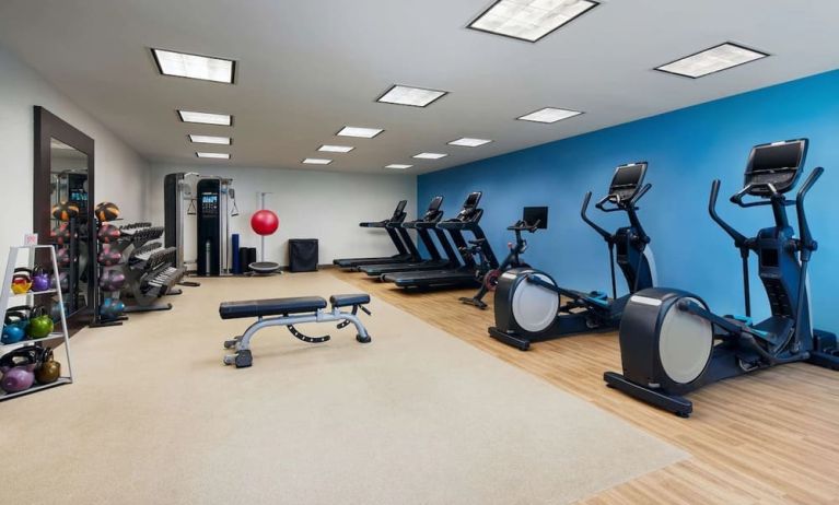 Fitness center at Embassy Suites By Hilton West Palm Beach Central.