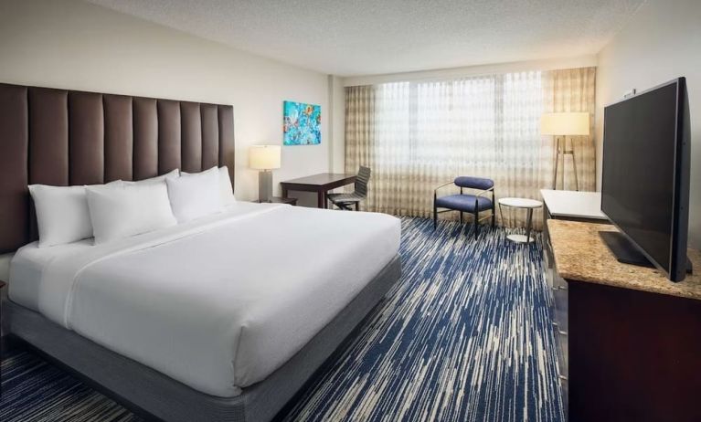 Day use room with work desk at Embassy Suites By Hilton West Palm Beach Central.