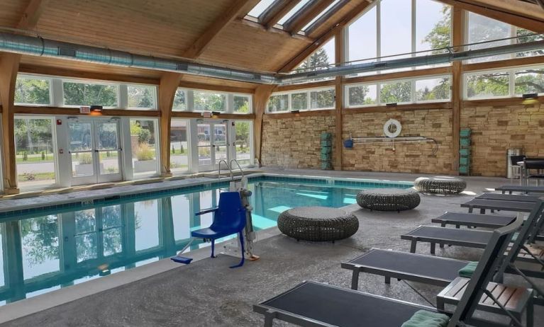 Pool loungers and indoor pool at Crowne Plaza Chicago SW.