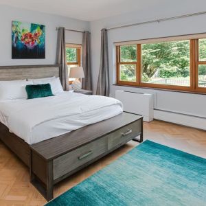 King bed at SKYLARANNA Resort & Spa.