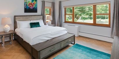 King bed at SKYLARANNA Resort & Spa.