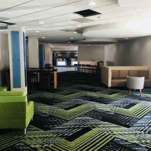 Lobby lounge area at Holiday Inn Express Towson Baltimore North.