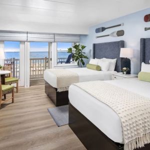 Day use twin room with workspace and balcony at Sea Crest Beach Hotel.