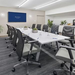 Professional meeting room with ergonomic chairs at Sea Crest Beach Hotel.