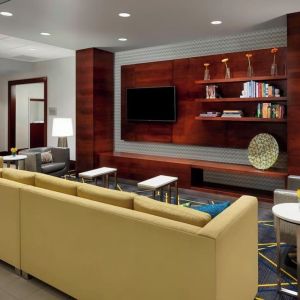 Lobby lounge with comfortable seating, perfect for coworking at Courtyard Boston Cambridge.