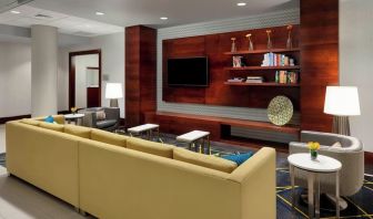 Lobby lounge with comfortable seating, perfect for coworking at Courtyard Boston Cambridge.