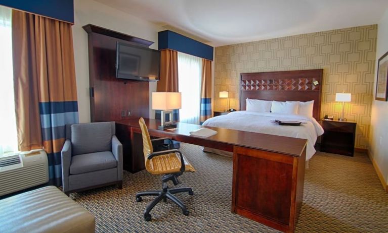 Day use suite with workspace and living area at Hampton Inn & Suites Trophy Club - Fort Worth North, TX.