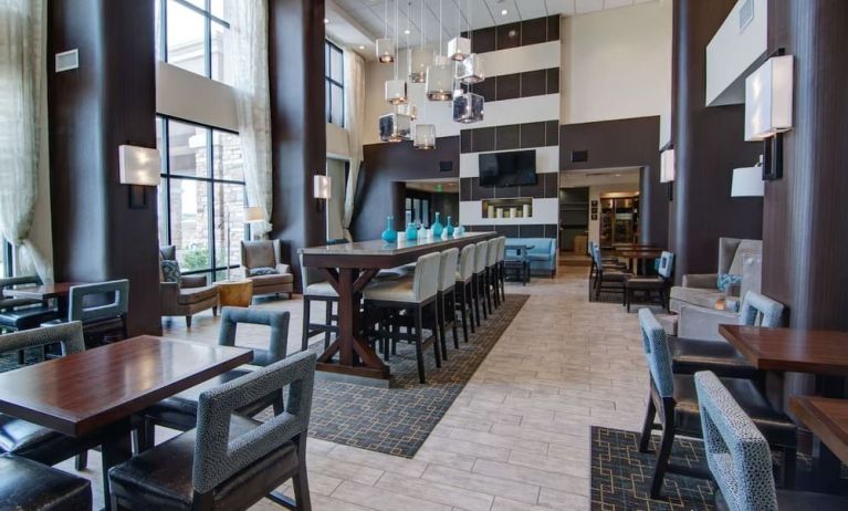 Dining area with comfortable seating, perfect for coworking at Hampton Inn & Suites Trophy Club - Fort Worth North, TX.