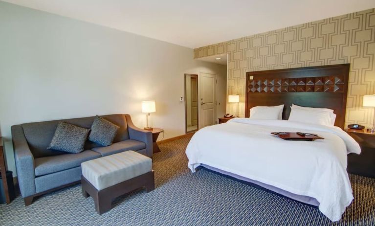 King room with sofa and private bathroom at Hampton Inn & Suites Trophy Club - Fort Worth North, TX.