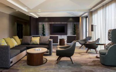 Lobby lounge area with comfortable seating at Sonesta Select Atlanta Norcross I-85.
