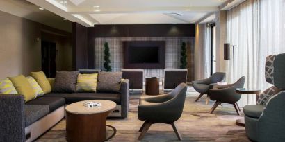 Lobby lounge area with comfortable seating at Sonesta Select Atlanta Norcross I-85.
