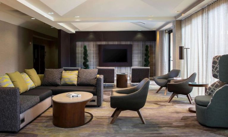Lobby lounge area with comfortable seating at Sonesta Select Atlanta Norcross I-85.