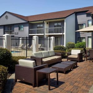 Hotel patio with lounge seating at Sonesta Select Atlanta Norcross I-85.