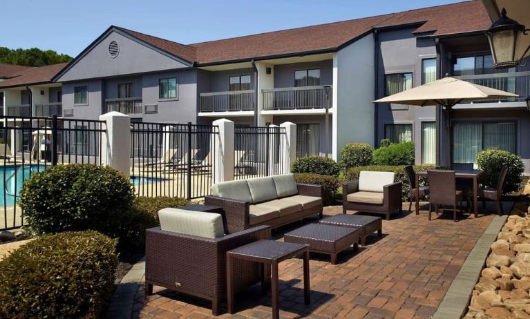 Hotel patio with lounge seating at Sonesta Select Atlanta Norcross I-85.
