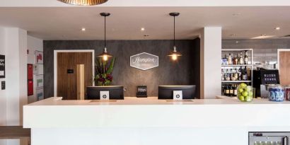 Reception desk at Hampton By Hilton Humberside Airport.