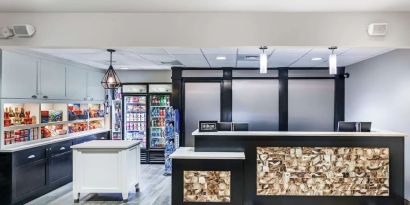 Reception and snack bar at Homewood Suites By Hilton Shreveport.